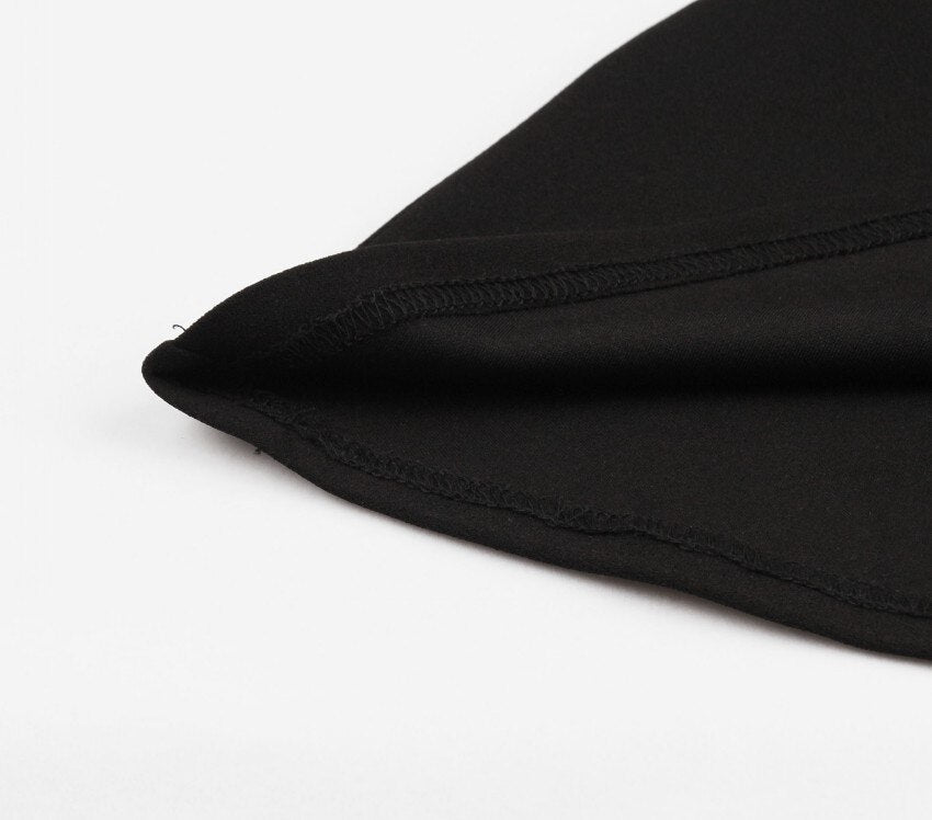 Eprolo black transparent mini dress displayed on a hanger, featuring sheer fabric and stylish design.