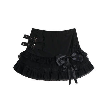 Eprolo low-rise bow mini skirt in black fabric, stylish and fitted, shown on a model.