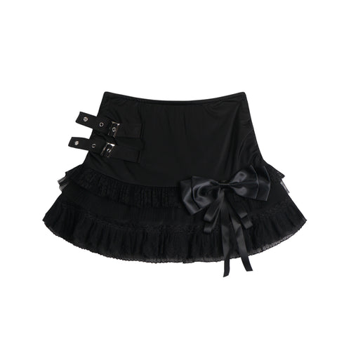 Eprolo low-rise bow mini skirt in black fabric, stylish and fitted, shown on a model.