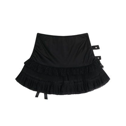Eprolo low-rise bow mini skirt in black, shown on a hanger with a smooth fabric and bow detail at the waist.
