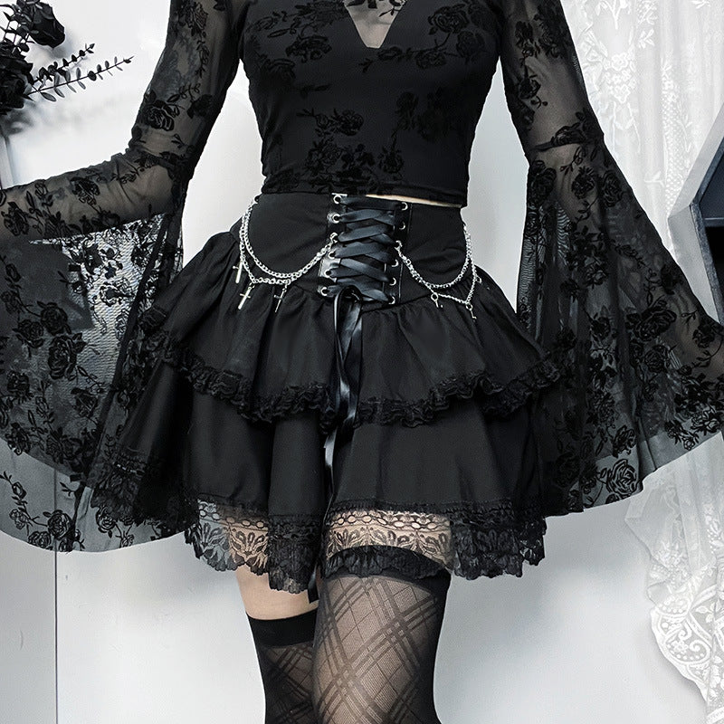 Layered Gothic zincir detail skirt by eprolo featuring a layered design and chain accents, shown on a model.