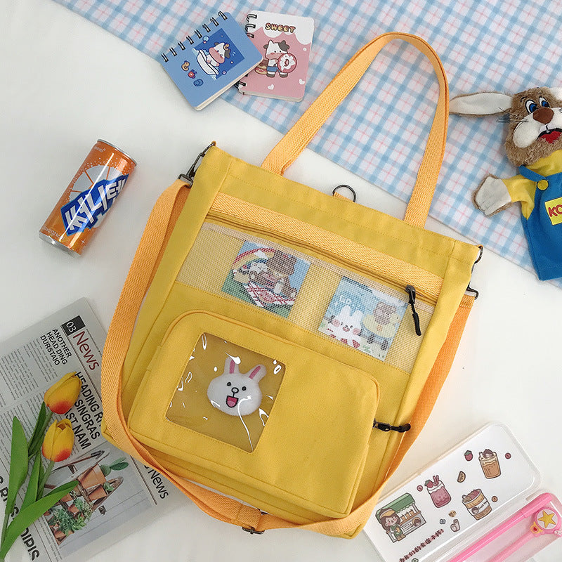 Large capacity canvas tote bag featuring a bunny figure design from eprolo, ideal for shoulder or backpack use.