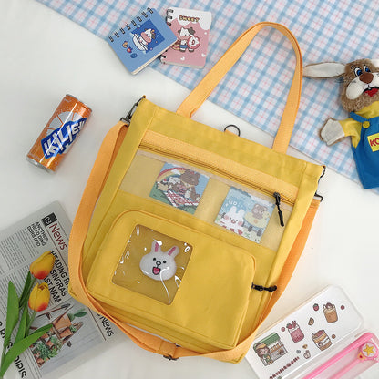 Large capacity canvas tote bag featuring a bunny figure design from eprolo, ideal for shoulder or backpack use.