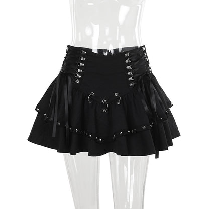 Metalik Punk mini etek by eprolo featuring shiny metallic fabric and a fitted waist, styled with a modern punk-inspired design.