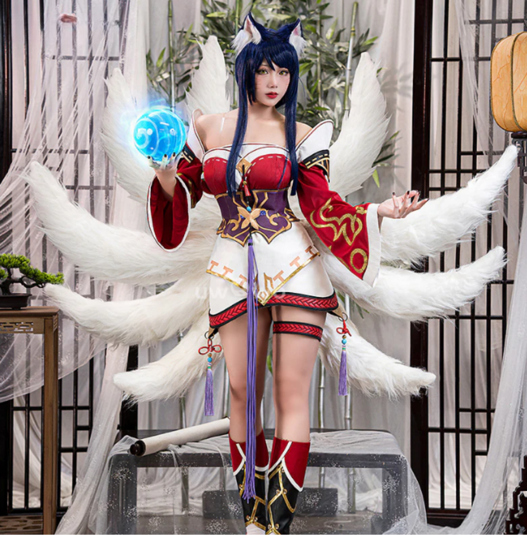High-quality Ahri cosplay costume with matching wig by Shadora, featuring detailed design and vibrant colors.