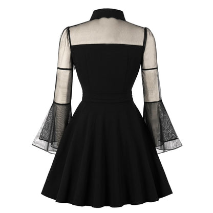 Eprolo black transparent mini dress with long sleeves and fitted silhouette, shown on a model.