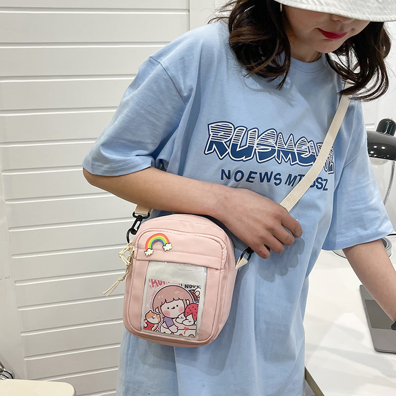 Small cartoon-style shoulder bag by eprolo featuring a Kore-inspired design with colorful character illustrations.