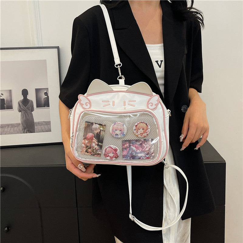 Y2K Kedi figürlü eprolo İta crossbody çanta with adjustable strap and colorful cat design, suitable for casual wear.