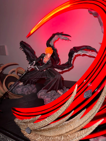 Brightly lit Ichigo Kurosaki figure from Bleach by Shadora, showcasing detailed character design on a dark background.