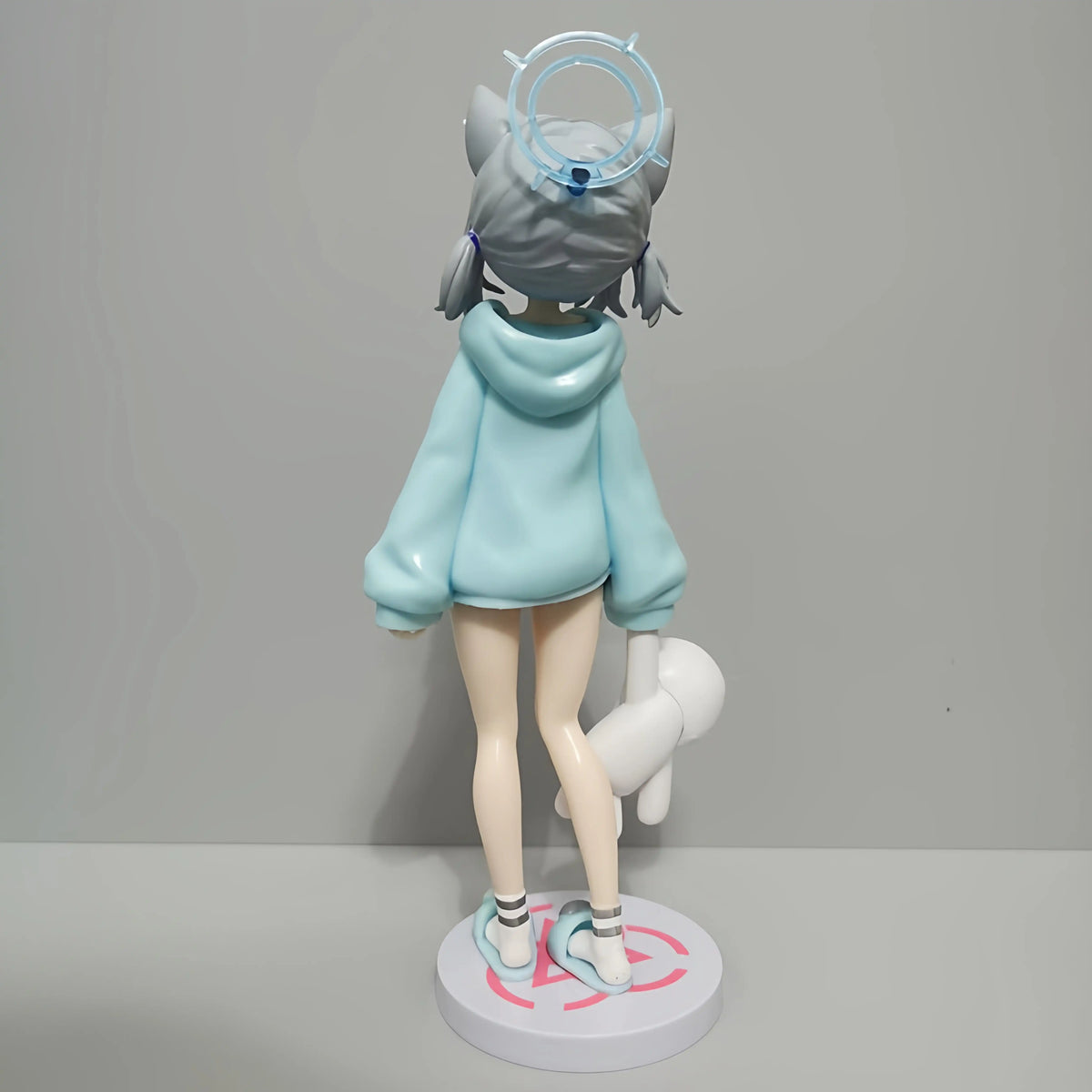 Shadora Sunaookami Shiroko figure with detailed white wolf design, standing pose, collectible anime-inspired figure on a plain background.