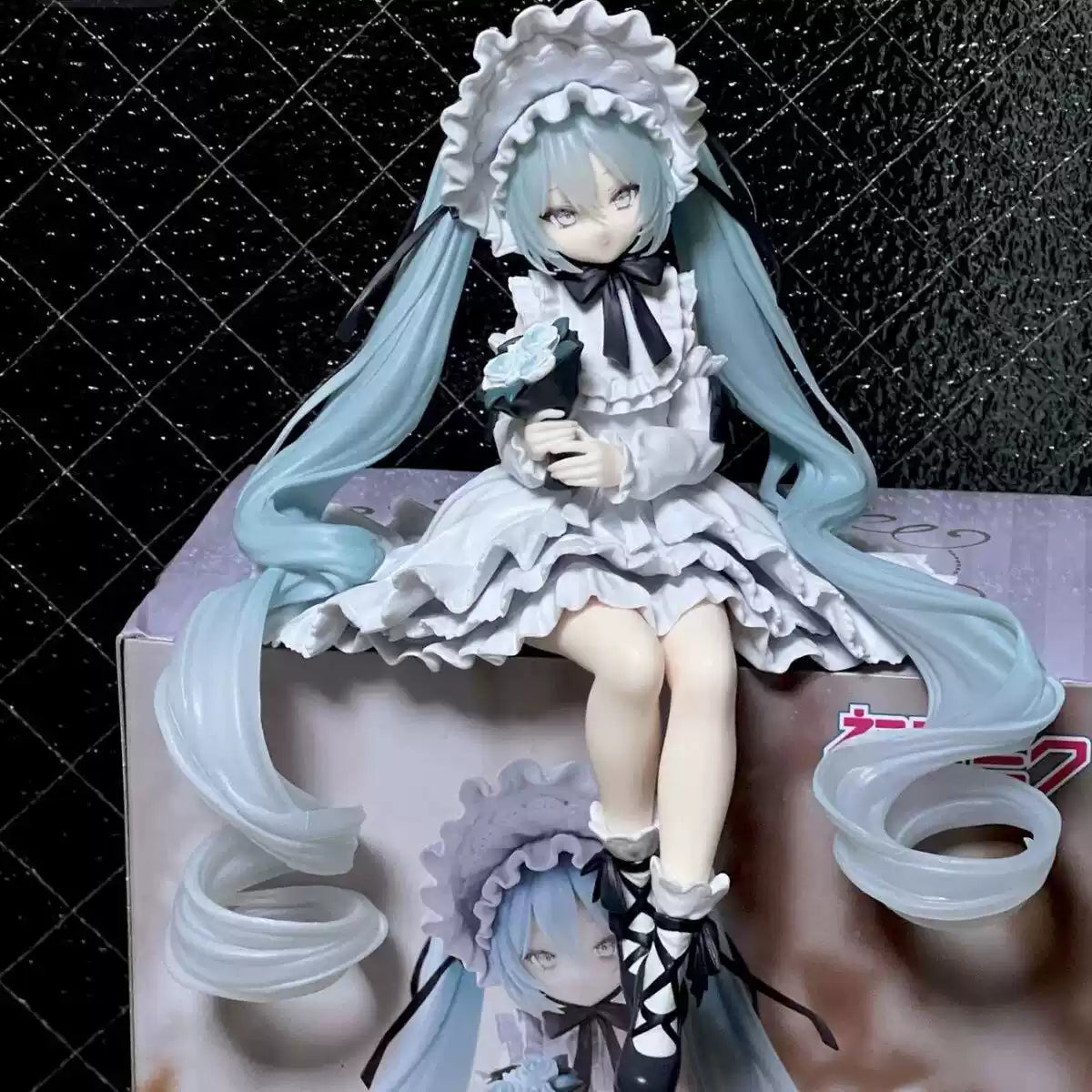 Hatsune Miku retro model figure by Shadora, detailed collectible figurine showcasing Miku's iconic teal hair and futuristic outfit.