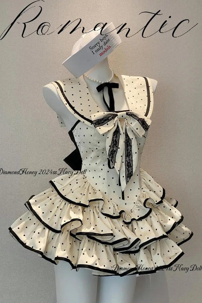 Nokta Detaylı Şirin Katlı Mini Elbise by eprolo, featuring intricate dot patterns and a layered, stylish design.