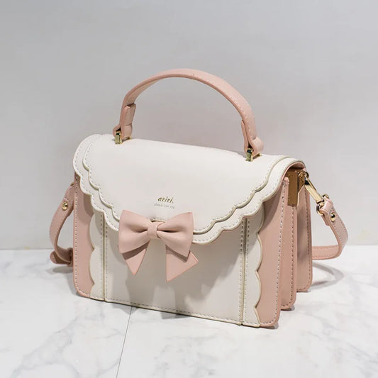 Shadora Kawaii Lolita Kare Çanta in pastel pink with delicate bow and floral details, perfect for cute fashion accessories.