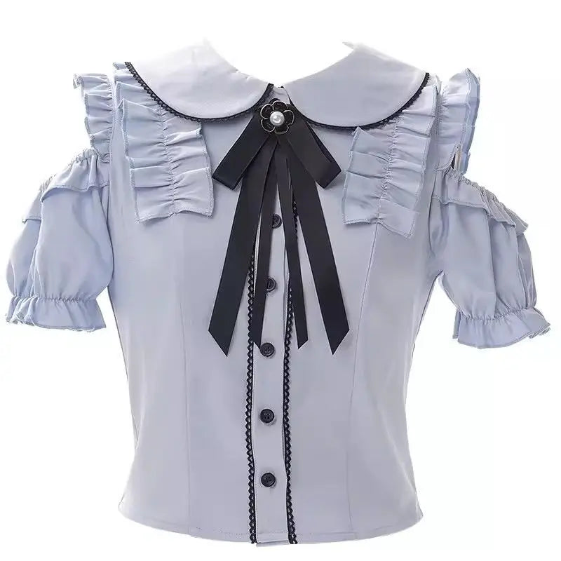 Eprolo Jirai Kei Fiyonklu off-shoulder blouse with black skirt set, featuring ruffled details and elegant design, shown on a model.
