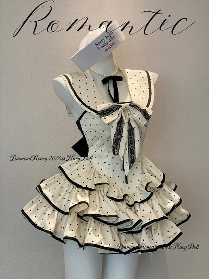 Nokta detaylı Şirin katlı mini elbise by eprolo, featuring intricate dot patterns and a layered, stylish design.