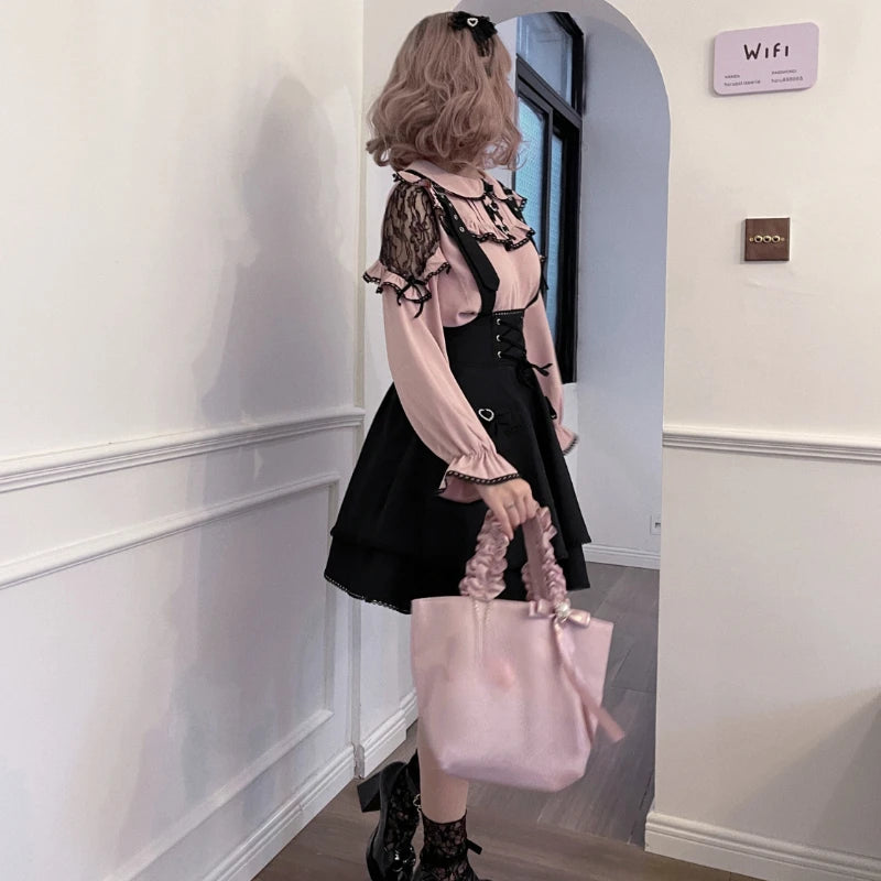 Pink and black Lolita blouse and skirt set with ruffled details, featuring a feminine and elegant style.