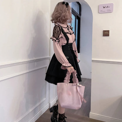 Pink and black Lolita blouse and skirt set with ruffled details, featuring a feminine and elegant style.