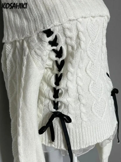 White kawaii shoulder-open sweater by eprolo featuring a cozy, stylish design with delicate shoulder cutouts and soft knit fabric.