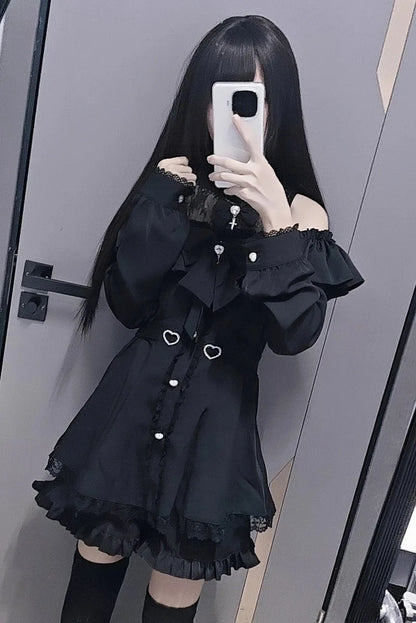 Eprolo low shoulder long sleeve dress and shorts two-piece set, black fabric with stylish design, shown on a model.