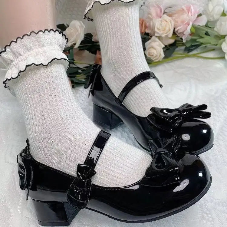 Eprolo Lolita style Mary Jane shoes with large bow detail and rounded toe, designed for a cute, vintage-inspired look.