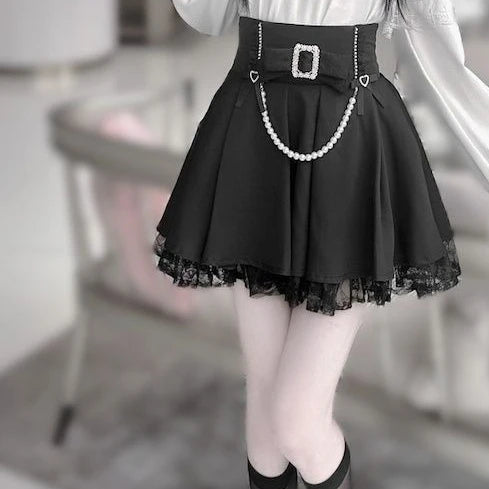 Eprolo Fiyonklu dantel detaylı bluz ve etek seti, elegant fashion ensemble with lace accents and bow embellishments.