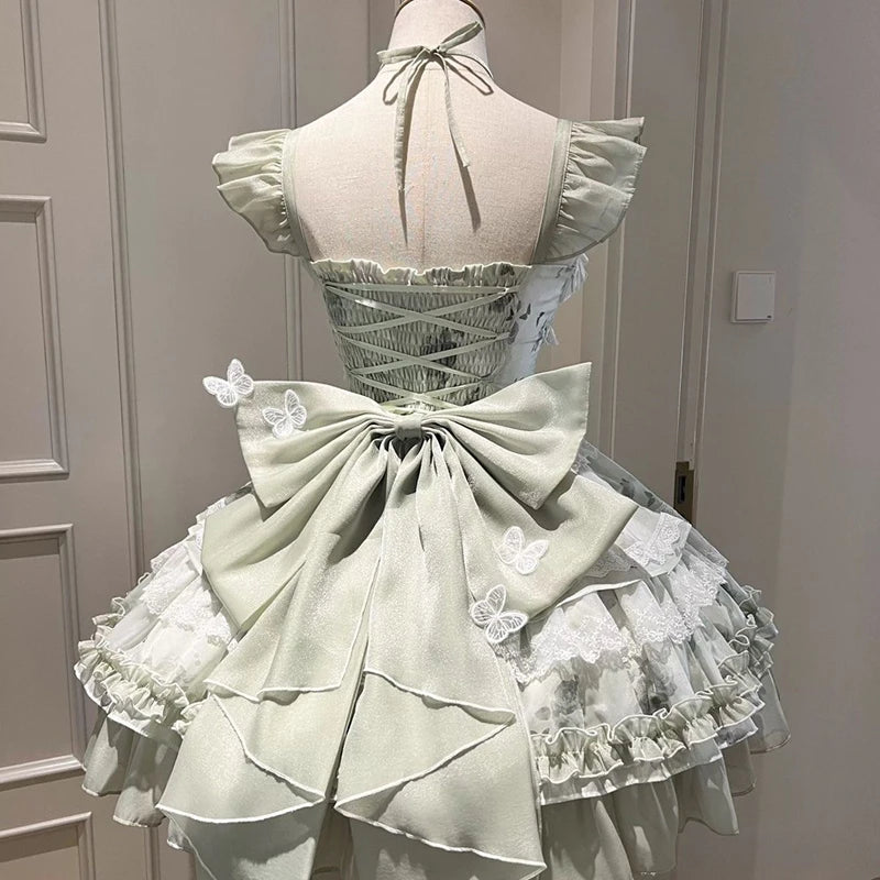 Eprolo Zarif Mini Lolita dress in pastel pink with lace details and ruffled sleeves, displayed on a mannequin.