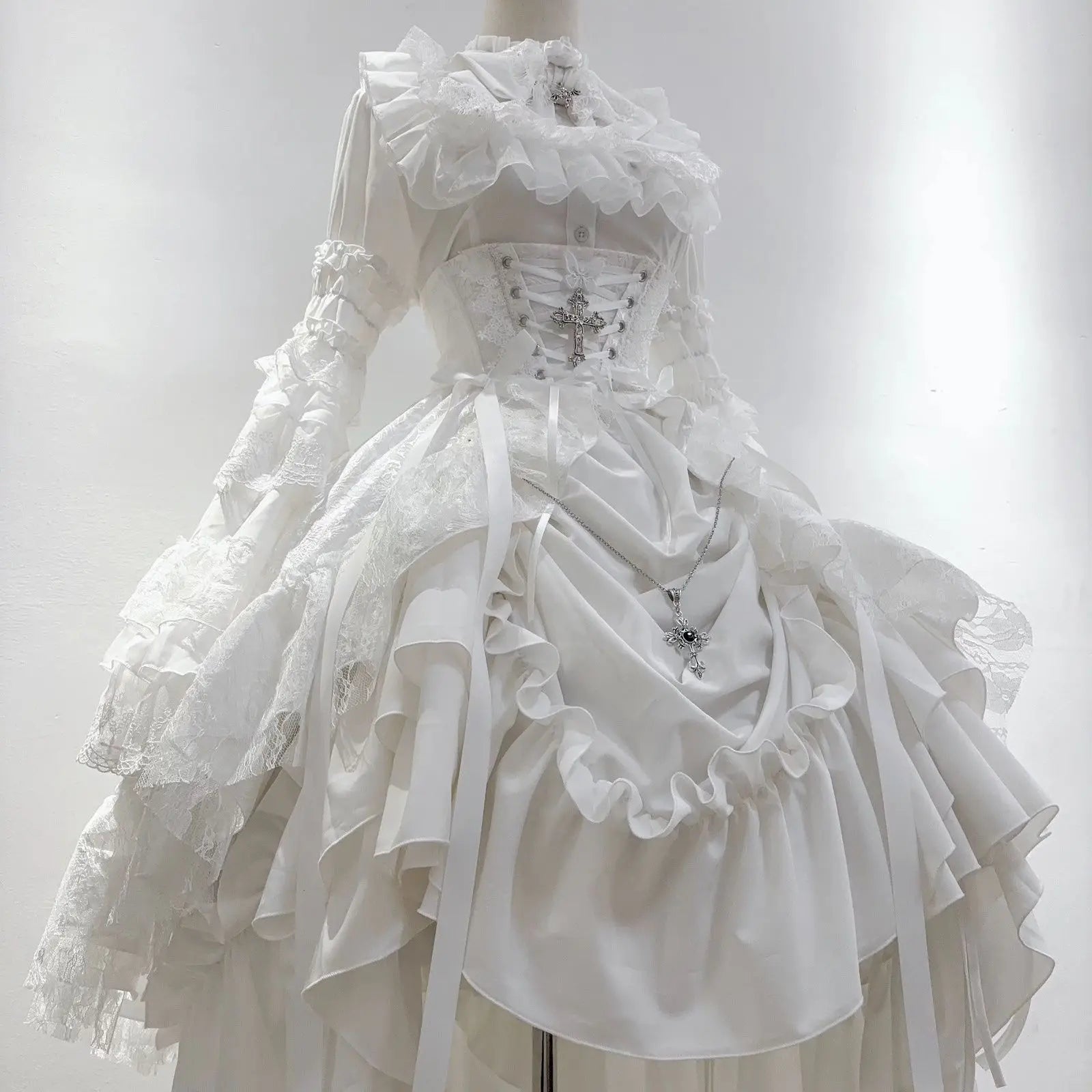 Victorian Gothic black dress with ruffled details and lace accents, featuring a fitted bodice and flowing skirt from eprolo.