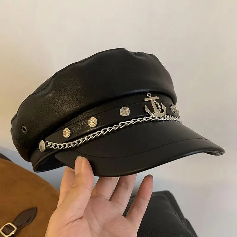 Vintage black leather grunge hat from eprolo featuring a distressed, stylish design with a brim and textured finish.