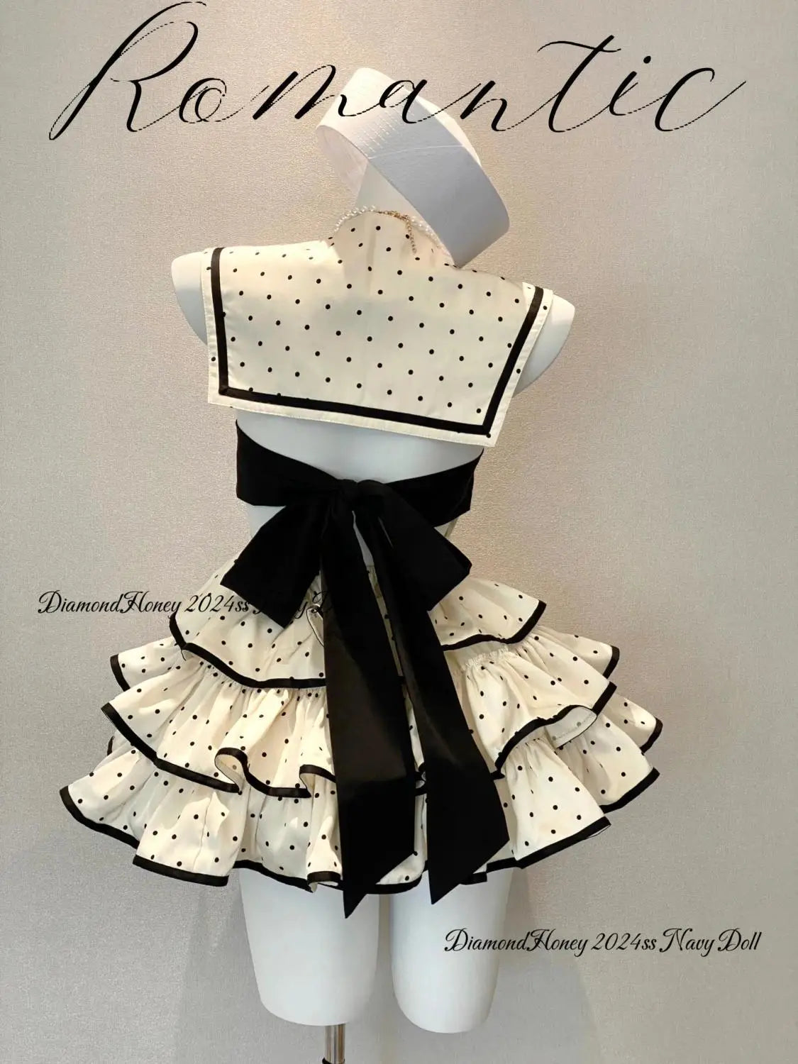 Eprolo Nokta Detaylı Şirin Katlı Mini Elbise with intricate dot patterns and layered design, shown on a mannequin.