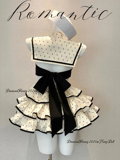 Eprolo Nokta Detaylı Şirin Katlı Mini Elbise with intricate dot patterns and layered design, shown on a mannequin.