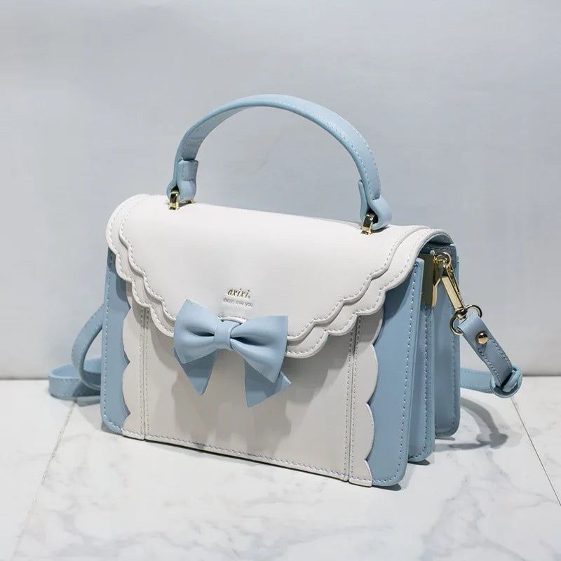 Shadora Kawaii Lolita Kare handbag with cute design, featuring soft pastel colors and decorative elements on a white background.