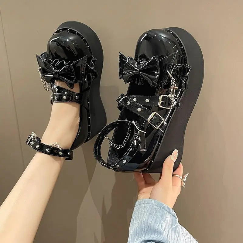 Eprolo Gothic Lolita platform Mary Jane shoes with chunky heels and black straps, detailed with bow accents and modern Gothic style.