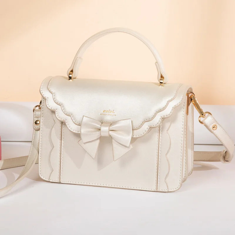Kawaii Lolita Kare bag by Shadora featuring a cute, pastel-colored design with bow accents and versatile carry handles.