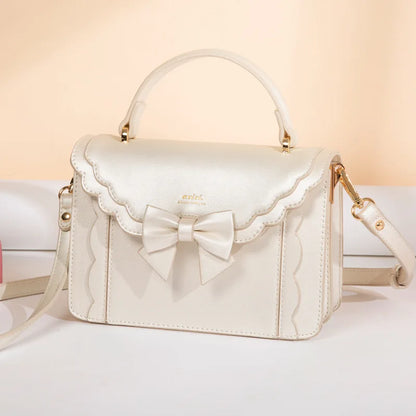 Kawaii Lolita Kare bag by Shadora featuring a cute, pastel-colored design with bow accents and versatile carry handles.