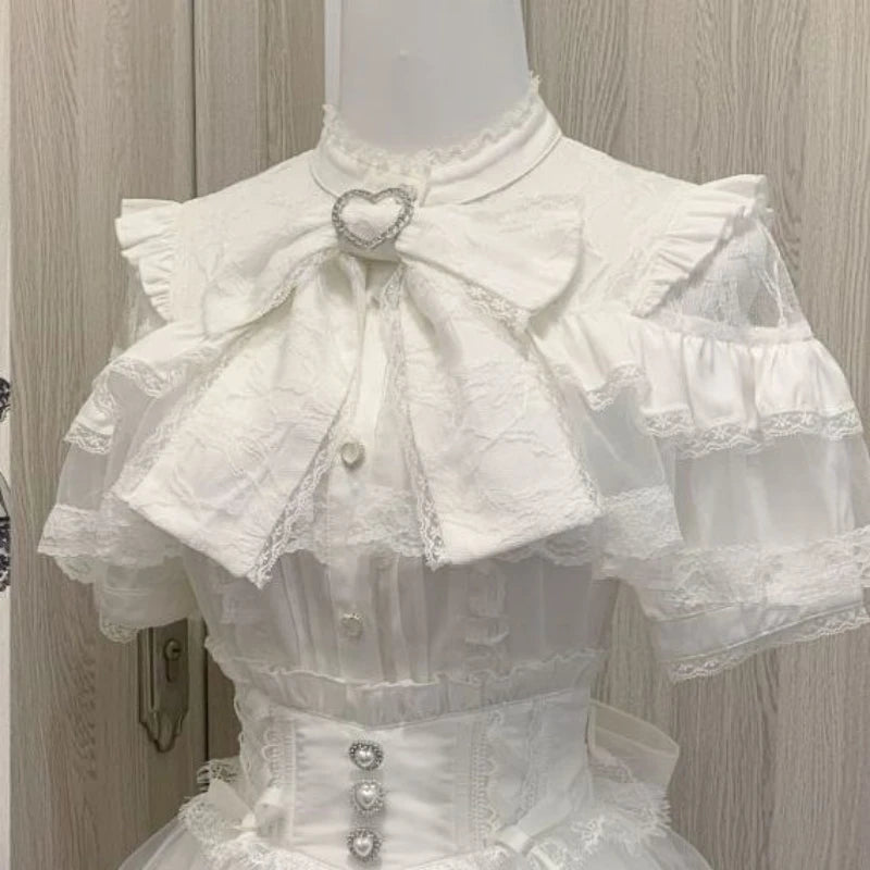 Shadora Jirai Kei Kawaii lace Lolita blouse with ruffled details and floral accents, featuring a feminine and elegant design.