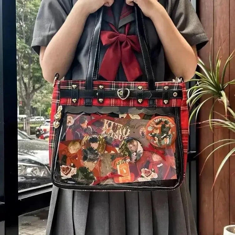 Eprolo Ekose desenli şeffaf cepli Ita bag with black handles and gold hardware, stylish and functional accessory.