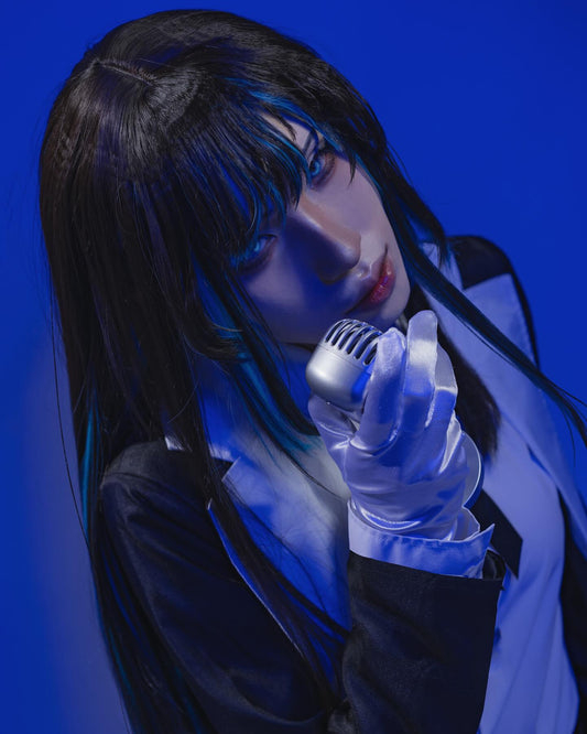 Shadora Ado cosplay wig with styled black hair and side bangs, worn by a person in costume for a cosplay event.