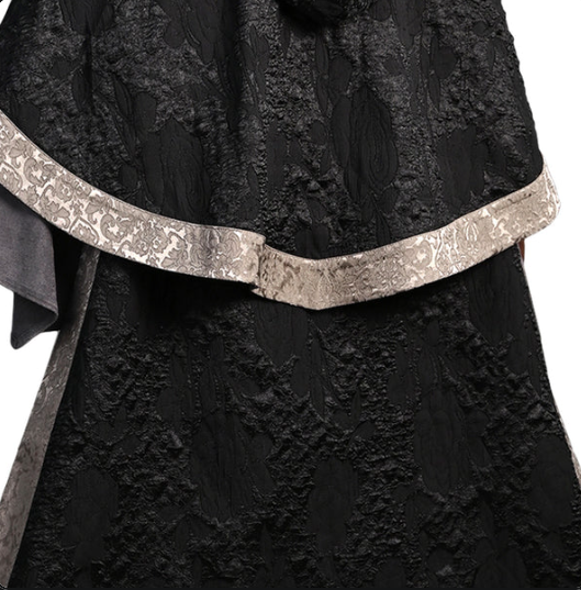 Fire Keeper cosplay costume by Shadora featuring a detailed design with flowing fabric and intricate accessories.