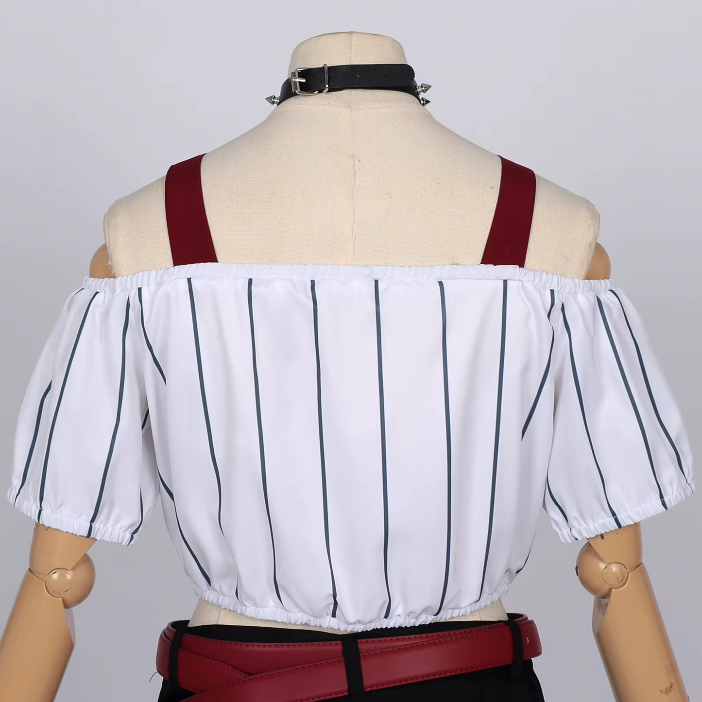 Kirara Cosplay with wig from Jujutsu Kaisen by Shadora, featuring detailed costume and vibrant hair in a natural pose.