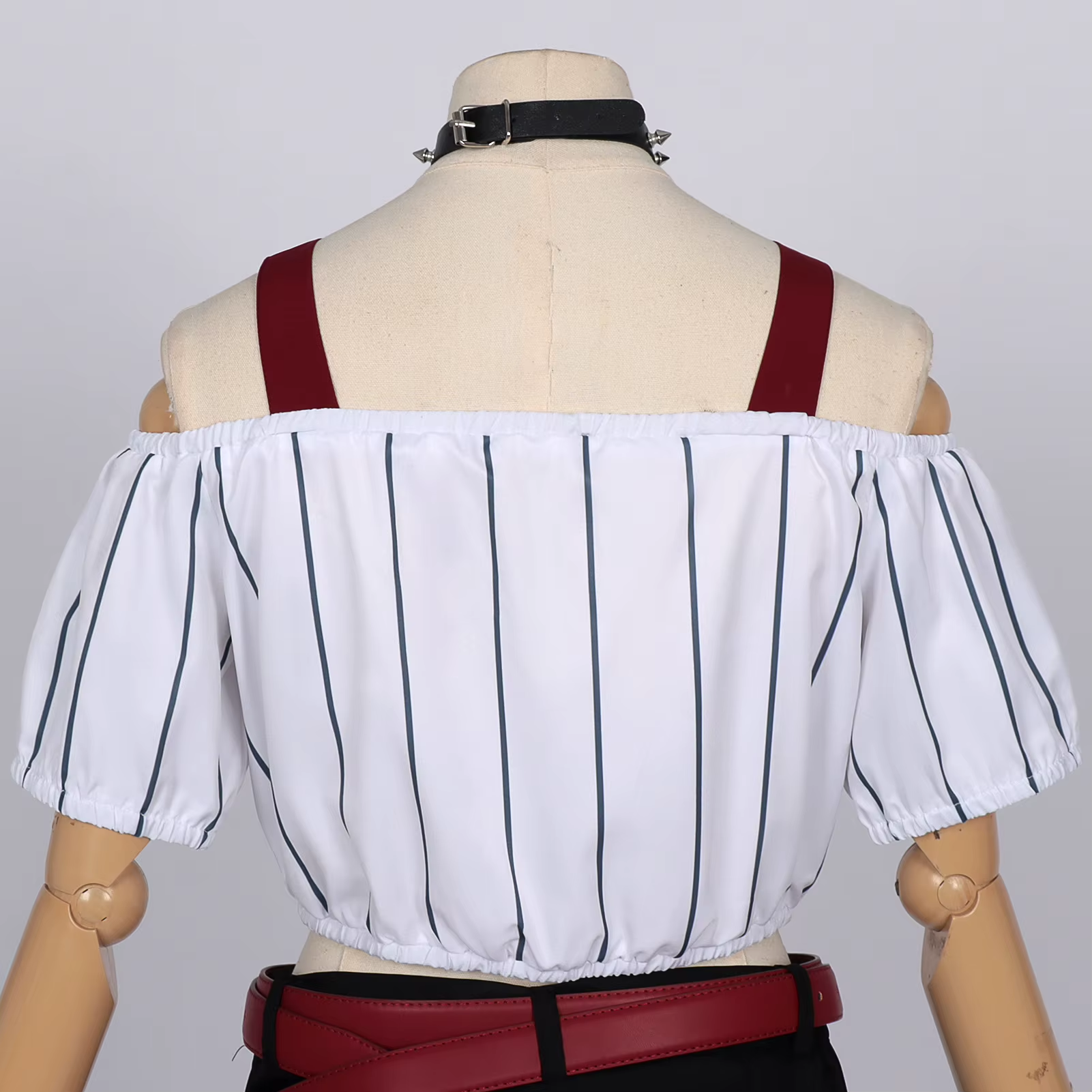 Kirara Cosplay with wig from Jujutsu Kaisen by Shadora, featuring detailed costume and vibrant hair in a natural pose.