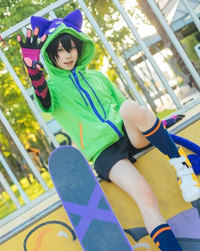 Miya Chinen cosplay with matching wig by Shadora, featuring detailed costume and styled hair for accurate character appearance.