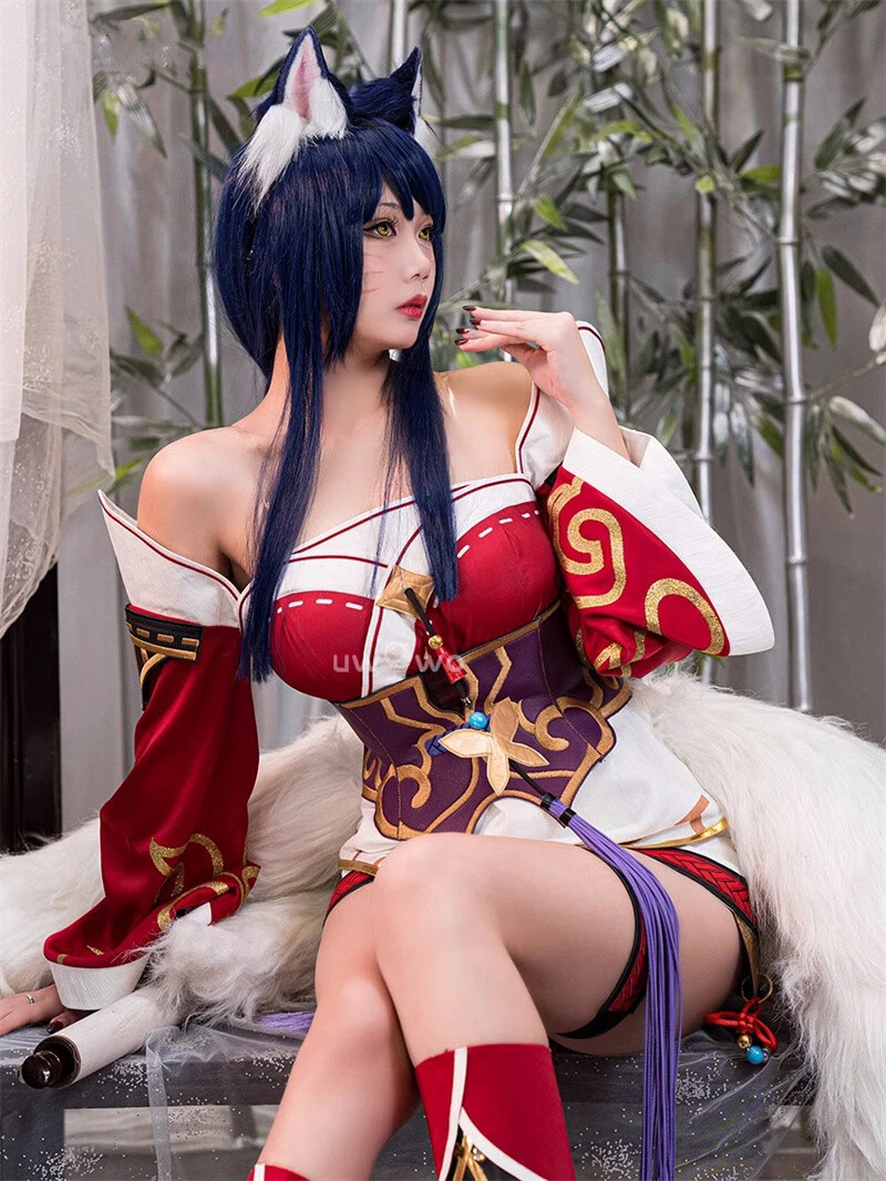 High-quality Ahri cosplay costume with wig from Shadora, featuring detailed design and vibrant colors for cosplay or costume events.