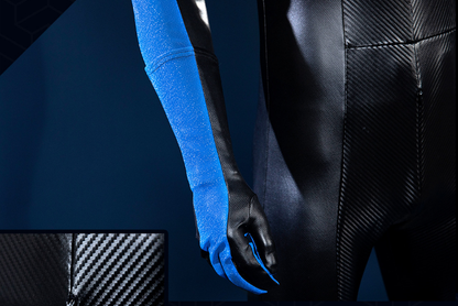 Nightwing Grayson cosplay costume by Shadora featuring a sleek black and blue suit with a mask and utility belt.