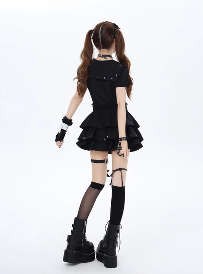 Shadora black high-waisted textured mini skirt displayed on a hanger, showcasing its bold, padded design and fitted silhouette.