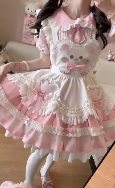 Eprolo Japon Still Pembe Şık Elbise displayed on a mannequin, featuring a stylish pink design with elegant details.
