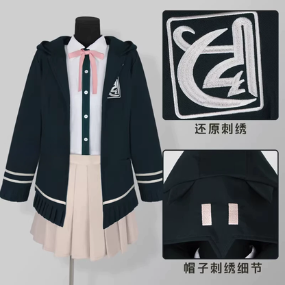 Chiaki Nanami cosplay with wig from Danganronpa, featuring her signature short blue hair and detailed costume by Shadora.