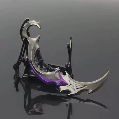 Shadora Yağmacı Karambit Bıçağı from Valorant, featuring a curved tactical knife with detailed design and vibrant colors.