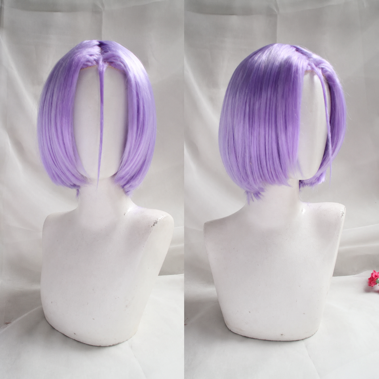 Shadora Julius Juukulius cosplay with wig from Re:Zero featuring detailed costume and styled brown hair in a realistic pose.