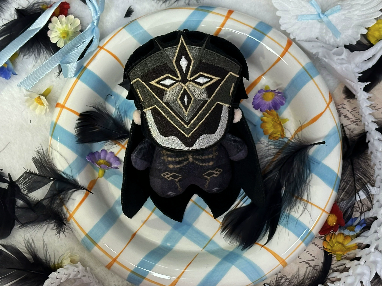 Shadora Fatui Peluşlar from Genshin Impact, soft plush toys featuring Fatui characters, on a neutral background.