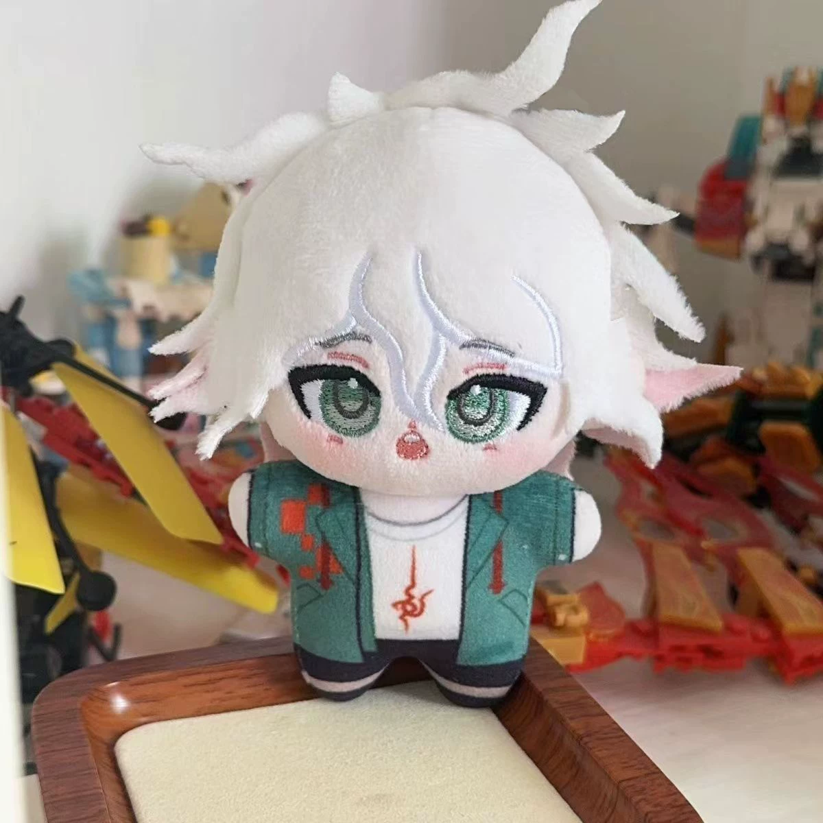 Set of plush dolls featuring Kokichi Oma, Chiaki Nanami, and Nagito Komaeda from Danganronpa by Shadora, with detailed character designs.